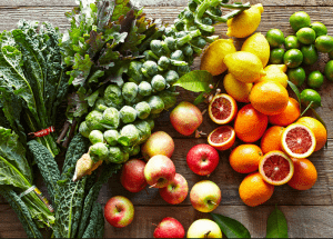 a group of fruits and vegetables on a wood surface Healthy Weight Loss Diets Barry